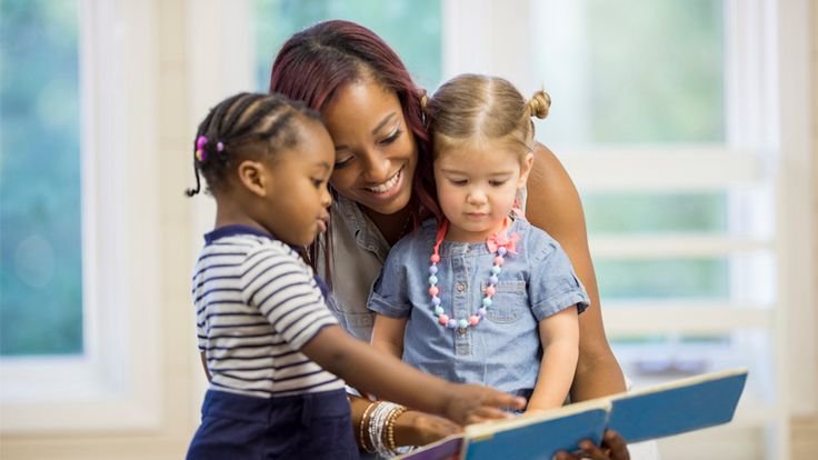 Educator supporting children
